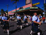 A parade marches through the streets of Woy Woy celebrating Australia Day.