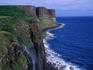 The Kilt Rock Waterfall drops dramatically to the sea down the sheer face of the cliffs on the Trotternish Peninsula, Isle of Skye - Scotland