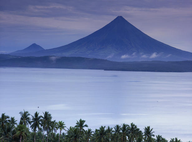 Mt Mayon, one of the world's most dangerous volcanoes, surrounded by other volcanoes.
