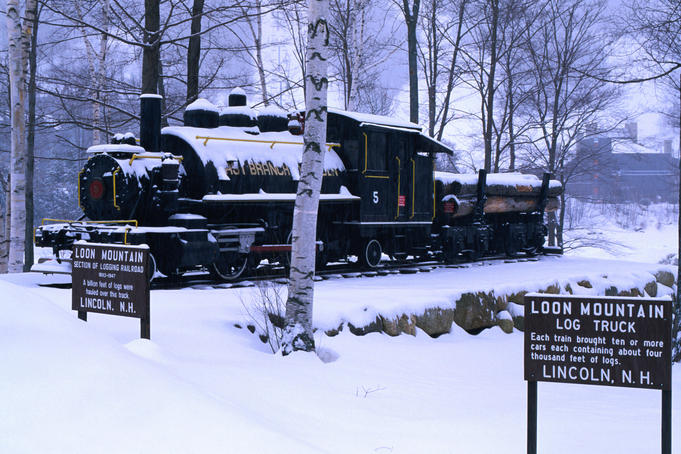 The Loon Mountain Railway: a parked train engine covered in snow