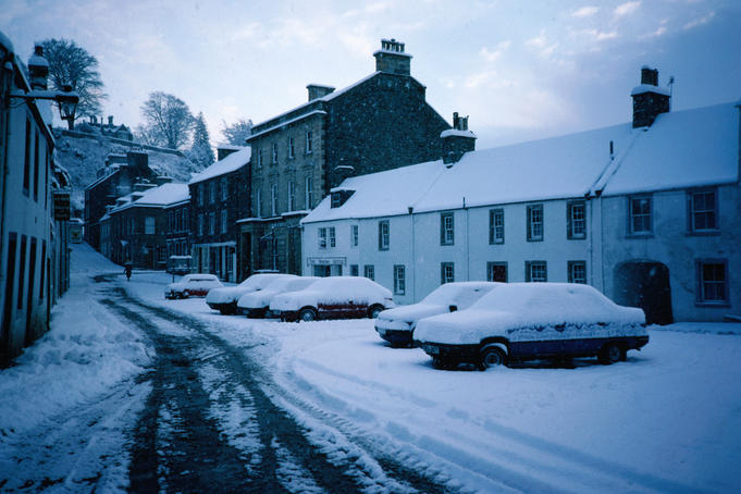 Cars under snow in the High Street of Dunkeld - Perth and Kinross, Scotland