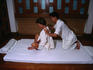 Tourist receiving a Traditional Thai or ancient massage, at the Oriental Hotel.