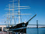 Walking past the large sailing ship docked at the wharf on the Savannah River