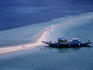 A narrow sand spit on Snick Island is a popular place to stop for a swim, El Nido