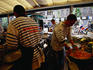 Cooks preparing seafood dishes in a seafood restaurant