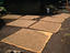 Drying seeds on mats in a village