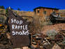 Stopping would be a good idea, according to this warning sign painted on discarded machinery at the Gold King Mine Museum, a ghost town near Jerome