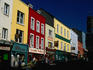 Colourful facades of shops line High Street, Kilkenny Town, County Kilkenny
