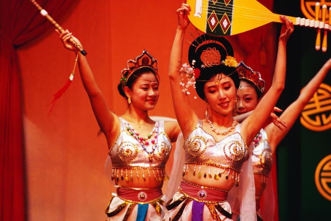 Chinese dancers performing in shopping centre.