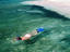 Woman snorkelling, Belize
