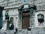 People sitting on the steps at the imposing entrance to the Duomo in Perugia
