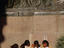 School girls studying in afternoon sunshine.