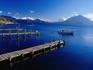 Lake Atitlan boat jetties with the view of Toliman and Atitlan Volcanoes