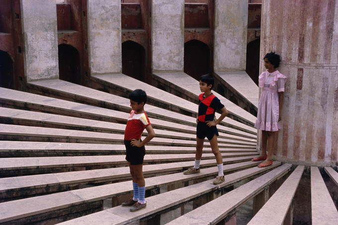Children playing at Jantar Mantar in Delhi. Jantar Mantar is a Medieval observatory built in 1724.