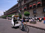 A pedicab on Calle Rep. de Argentina ( Argentina Street ) fronting the National Palace
