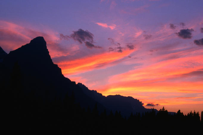Colourful sunset over the Rockies outside Jasper on the highway Icefields Parkway.