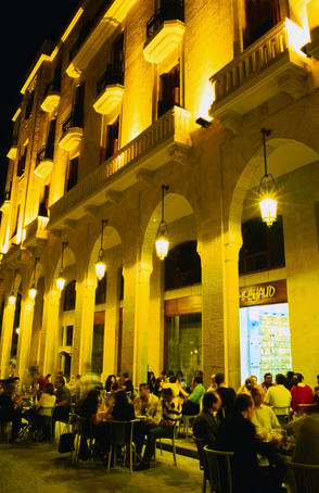 People dining al fresco in downtown area.