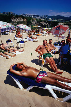 Enjoying the sunshine on the beach: sleeping in a deck chair