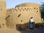 Man outside building, Gaoui, Chad
