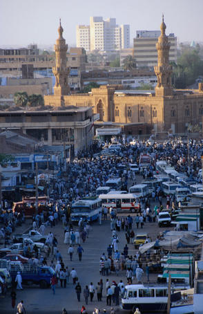 Street with Al-Kabir Mosque in distance, Sharia al-Jami.