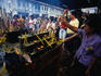 Devotees offering incense sticks at a temple in Georgetown, Penang Island