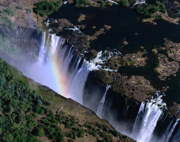 The world famous Victoria Falls, it has a 1.7 kilometre precipice and an average of 550,000 cubic metres of water plummeting 90 to 107 metres below into the Zambezi gorges every minute