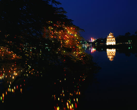 Evening view of the Tortoise Pagoda on Hoan Kiem Lake, Hanoi