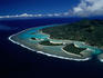An aerial view of Muri Lagoon and Avana Harbour with motus (reef islands) Koromiri, Oneroa and Motutapu (from left to right).