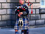 A piper with his bagpipes - Edinburgh, Scotland