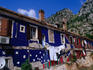 A bright mural decorates the side of this mountain-side house in the historic town of Kotor.