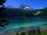 The rounded mass of Meded (2287m) rises behind Crno Jezero (Black Lake).