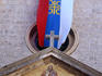 The Serbian flag hangs from the facade of St Nicholas' Church (1909) in the walled town.