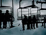 Ski lifts silhouetted.