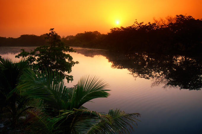 Sun rising over the still New River.