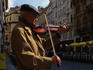 Violinist busking on the cobble-stone streets of Stare Mesto ( Old Town ), Prague