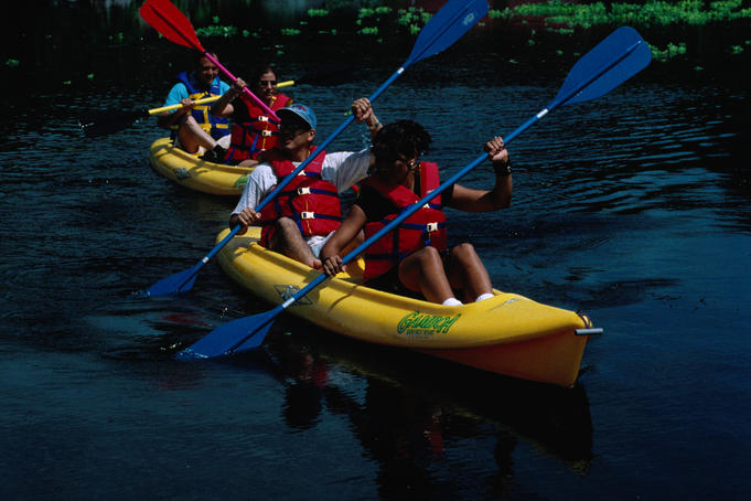 Kayakers enjoying a paddle on the Chagres river near the Gamboa Rainforest Resort.