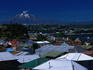 Rooftops of Puerto Montt and the distant cone of Volcan Calbuc (2003m).
