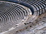 Demand for seats not what they used to be! A sole spectator in the Roman Theatre, Ephesus.