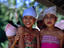 Young Rejang dancers from the Karangasem regency in Bali relaxing without their headress.