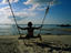 A giant beach swing is a great way to relax. Hat Yao Beach, Ko Pha-Ngan, southern Thailand.