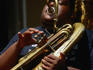 A sousaphone player blows a jazz tune in the French Quarter of New Orleans, Louisiana.