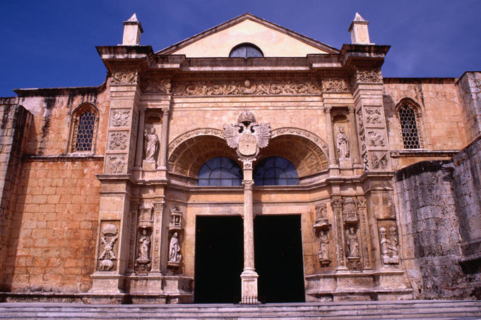 Facade and entrance to the Cathedral of Santa Maria la Menor, Santo Domingo. The cathedral was constructed in the early 1500s and is the oldest church in the West Indies.