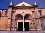 Facade and entrance to the Cathedral of Santa Maria la Menor, Santo Domingo. The cathedral was constructed in the early 1500s and is the oldest church in the West Indies.