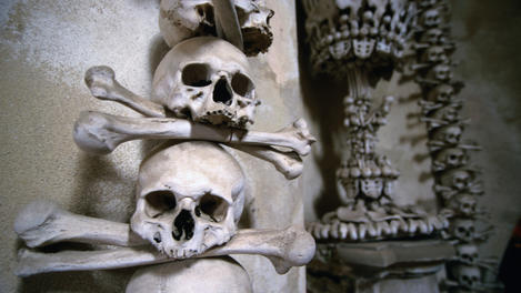Skulls and bones of monks and plague victims were arranged by a Czech woodcarver, Frantisek Rint. The displays,  in the chapel cellar of the Ossuary in Sedlec cloister, Kutna Horar, range from chalices and crosses to a skeletal chandelier.