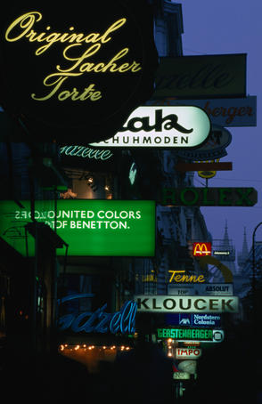 Shoppers heaven, lit street signs. Neon lights on the Kartnerstrasse.