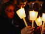 A pilgrim offers a candelight vigil in the Basilica at Fatima.
