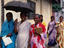 Sri Lankan women stroll through the Pettah, Colombo's bustling bazaar