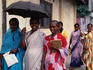 Sri Lankan women stroll through the Pettah, Colombo's bustling bazaar