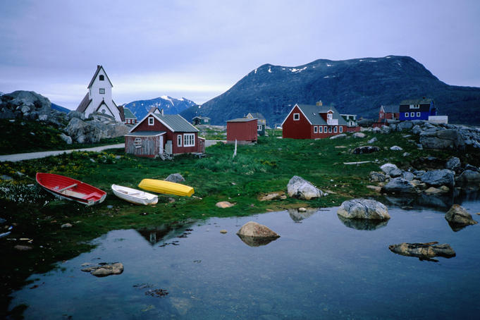 Peaceful old harbour and church.