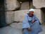 Man squatting, Amun Temple, Nile Valley